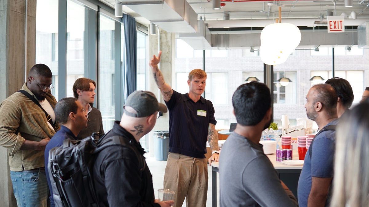 Justin Bergeron speaking with engineers at a Chicago builder meetup
